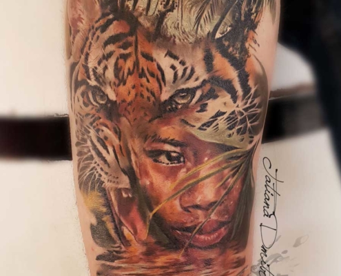 Tattoo tatuaje Realista tigre cara niño a color en brazo