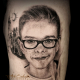 tattoo tatuaje retrato en realismo de niño hijo en blanco y negro en valencia 2